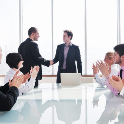 young business people group have  meeting at conference room and have discusion  about new ideas  plans and problems